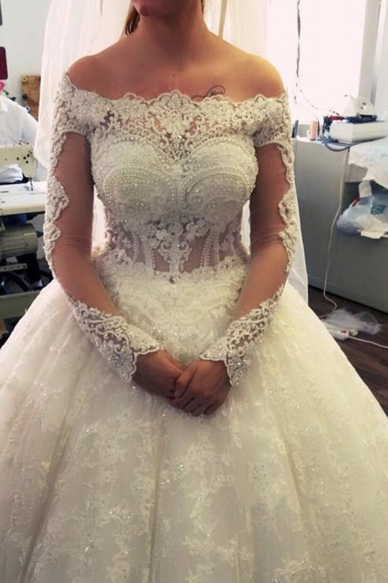 2024 Ball Gown Boat Neck Tulle With Applique And Beads Long Sleeves Wedding